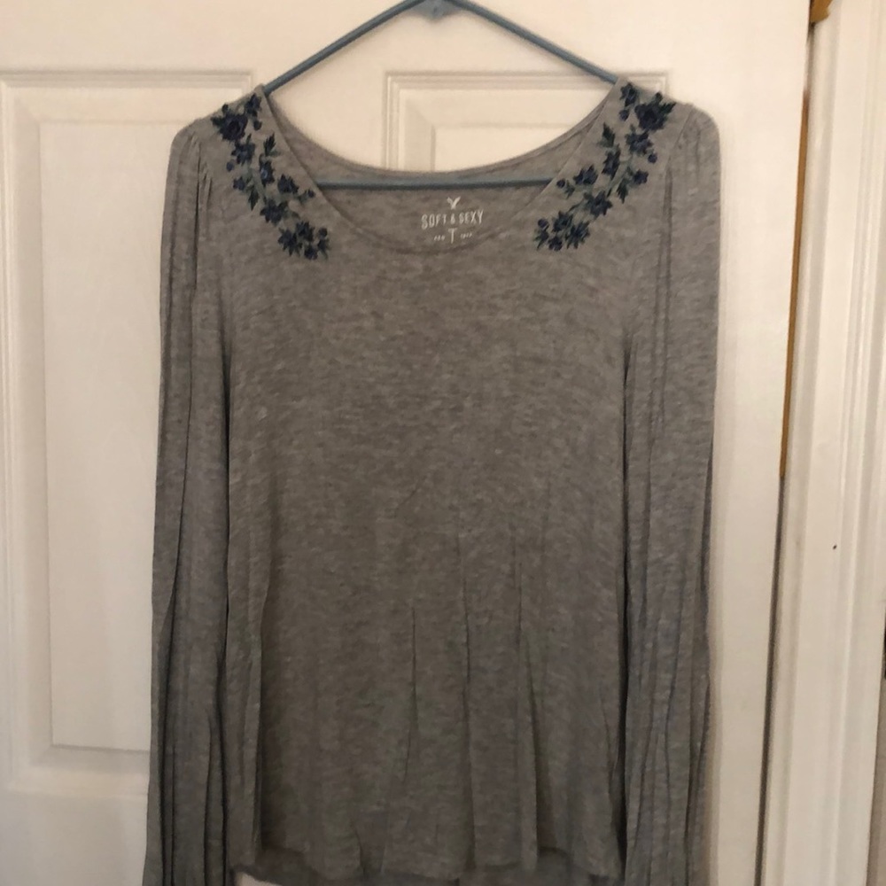 Grey long sleeve shirt with blue flowers